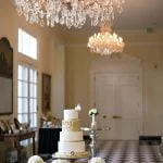 A wedding cake and a chandelier
