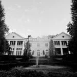 Black and White photo of the front of Duke Mansion